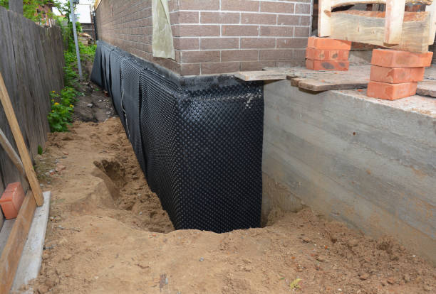 Happy homeowners after waterproofing job in Myersville